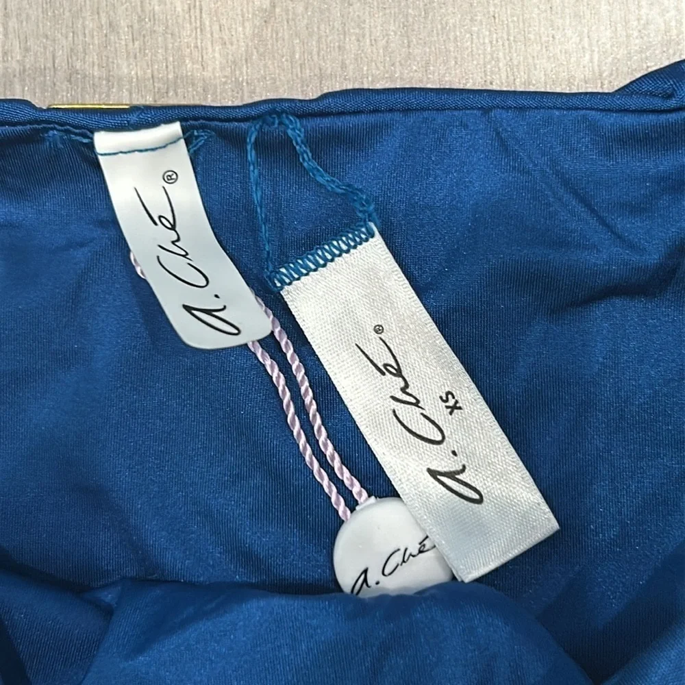 A. Che Jolie string ink blue swim bikini bottom size XS
